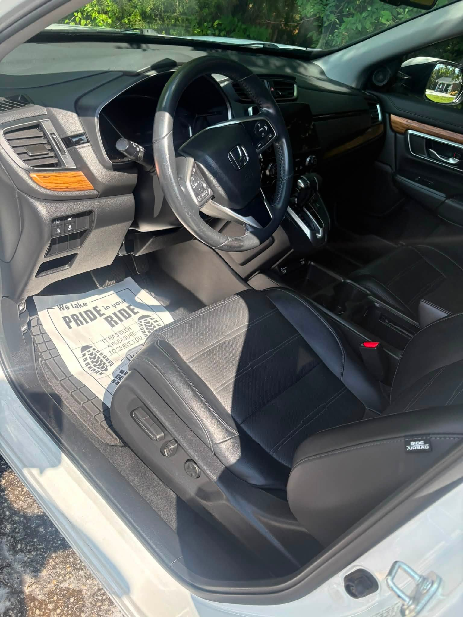 Driver's seat and dash of a detailed Honda CR-V